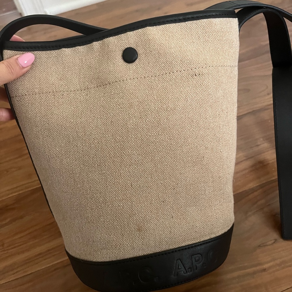 apc beige canvas helene crossbody bucket bag with black leather and logo